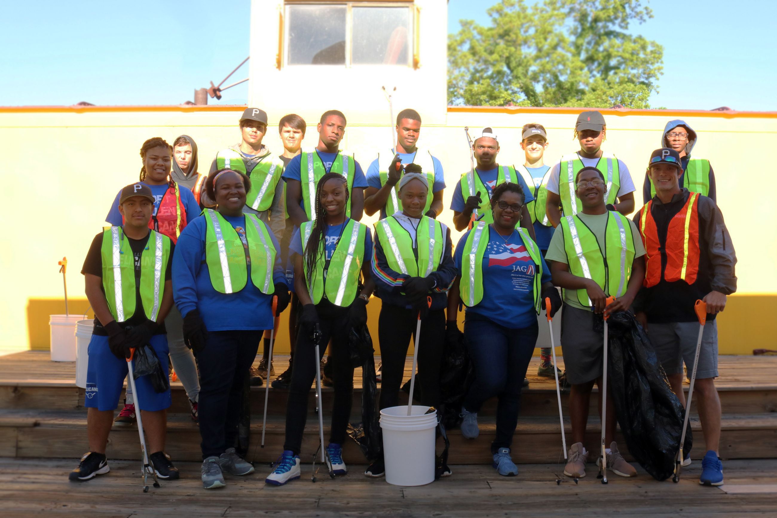 People cleaning up litter