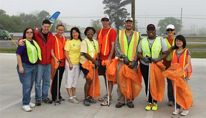 Valerie Jordan and fellow Dow employees picked up litter along LA 1, south of Brusly